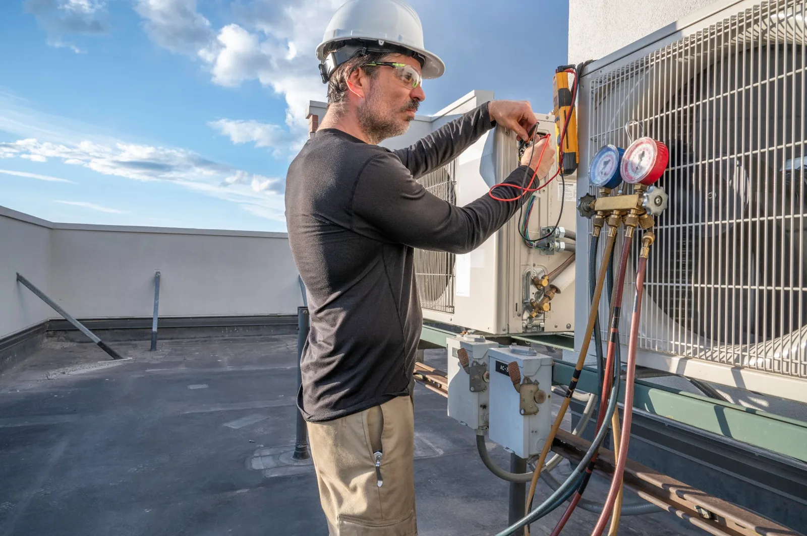 Friendly HVAC technician ready for a service call